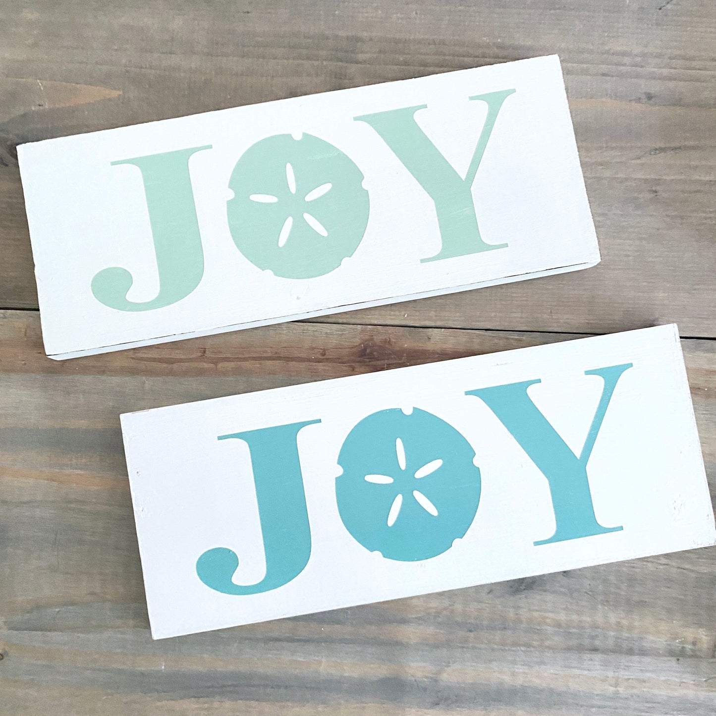 Joy Sand Dollar Sign