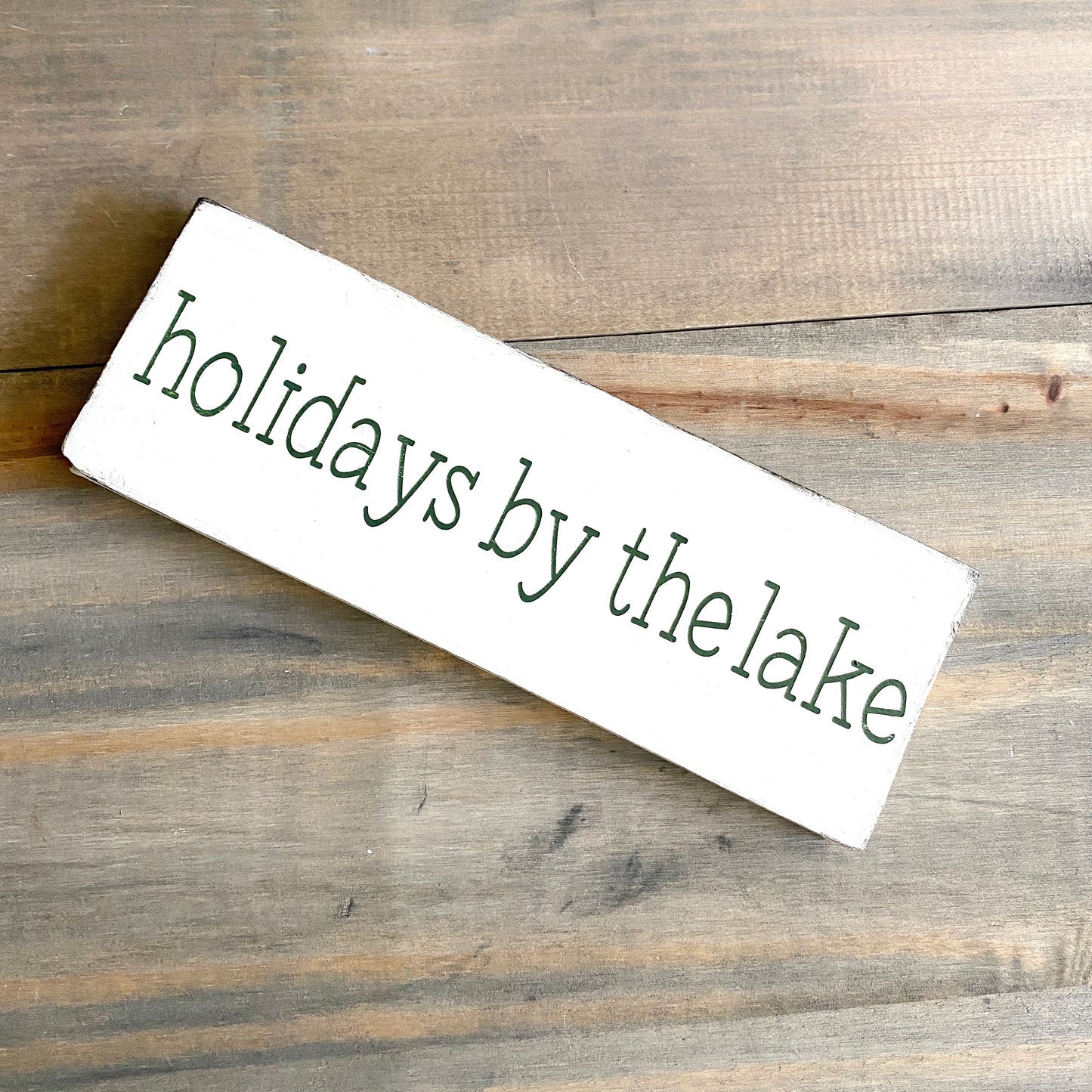 Holidays by the lake sign