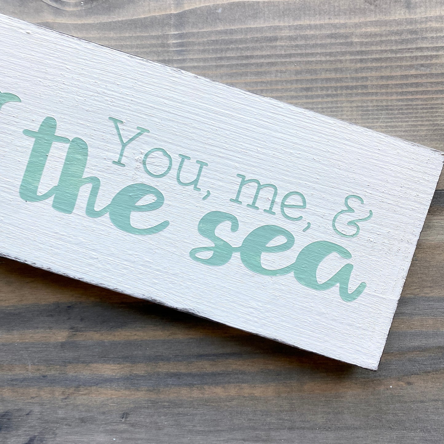 You, me, and the sea sign